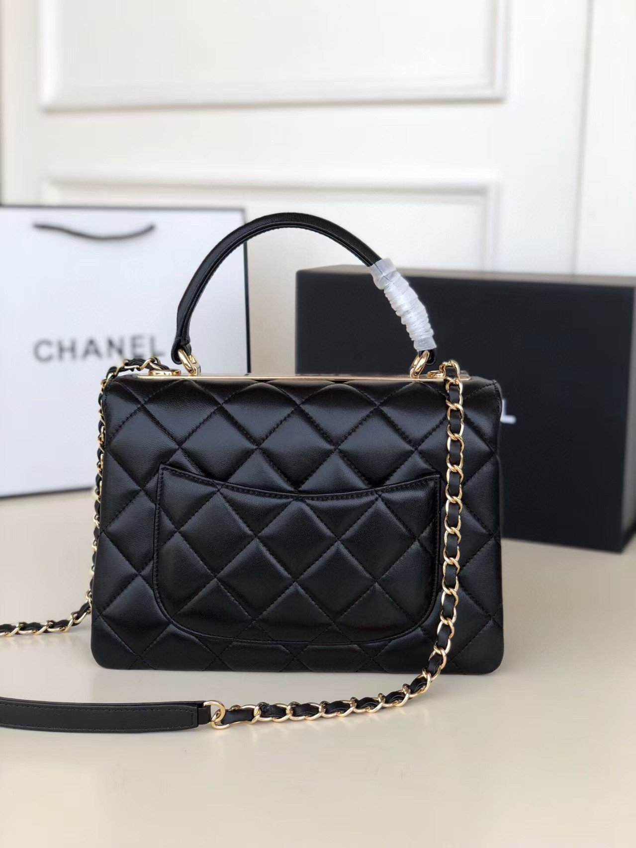 Ch*el flap bag with top handle 6.6 × 9.8 × 4.7 in