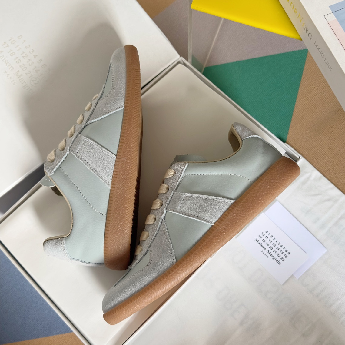 ua ma*s*n Ma*i*la mm6 sneakers